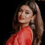 Tamil actress Oviya Helen at a public event.