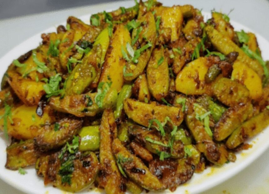 Hunterfly 2026 07 25 164859 Freshly cooked Kundru Bhaji made with ivy gourd, onions and spices served with bhakri.