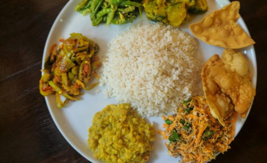 Traditional Indian staples including moong dal, dalia, rajma, turmeric, amla, bottle gourd, and lentils arranged in bowls.
