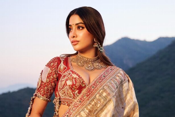Hunterfly 2026 07 26 103431 Janhvi Kapoor wearing an ivory-and-gold embroidered saree and a champagne-gold embellished ensemble.