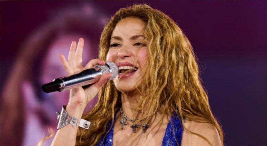 Hunterfly 26 07 08 111844 Shakira speaking at a public event while discussing confidence and self-expression