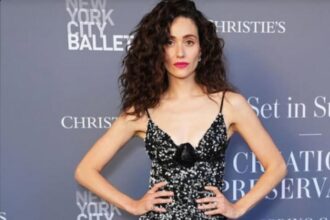 Emmy Rossum discussing her marriage and divorce from Justin Siegel during a podcast interview.