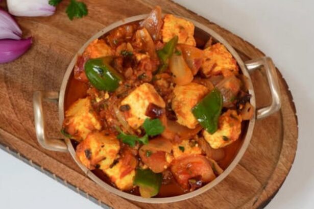 Hunterfly 26 07 25 171914 Homemade Paneer Shimla Mirch prepared with paneer cubes, capsicum, onions, tomatoes, and aromatic Indian spices.