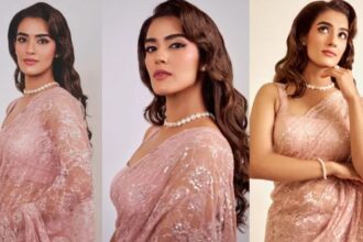 Kavya Thapar wearing an elegant pink saree with a sleeveless blouse.