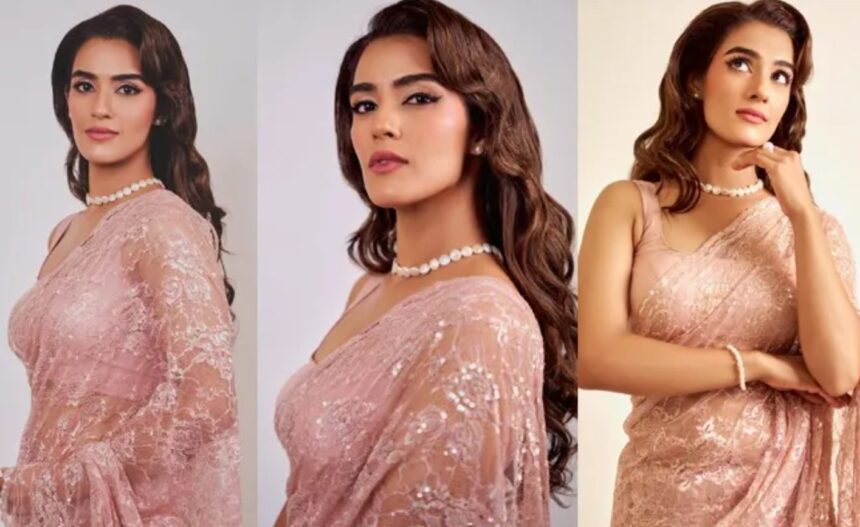 Kavya Thapar wearing an elegant pink saree with a sleeveless blouse.