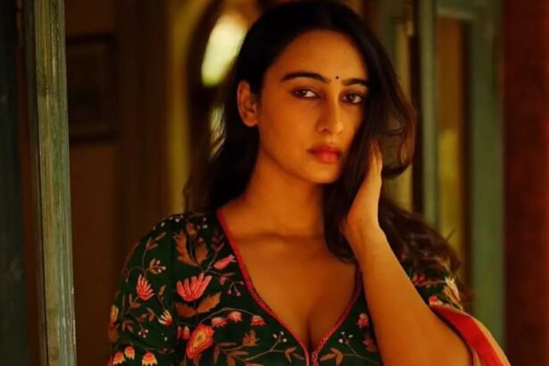Hunterfly Megha Shukla Impresses with Her Saree Looks Megha Shukla wearing a mustard saree with a floral blouse in her latest Instagram photos