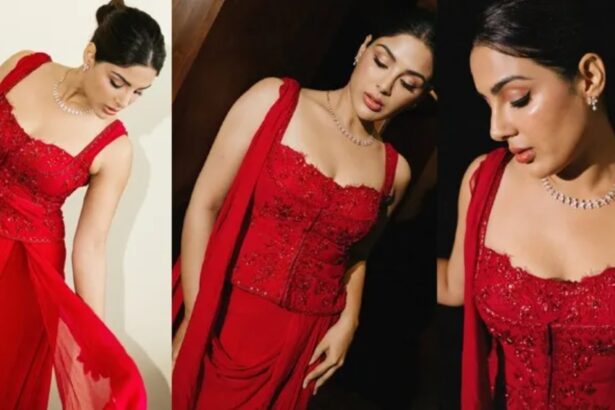 Samyukta Menon wearing an elegant red sleeveless dress with minimal accessories.