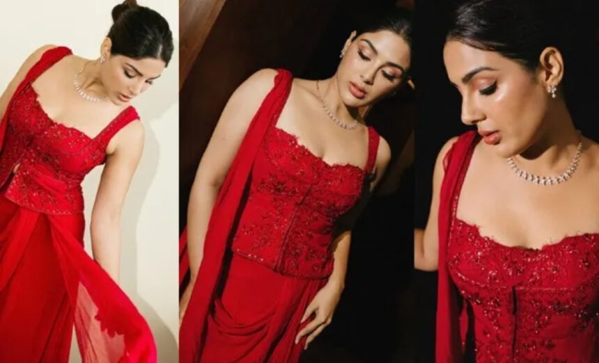 Hunterfly Menon radiates elegance in red Samyukta Menon wearing an elegant red sleeveless dress with minimal accessories.