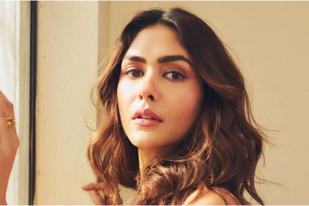 Hunterfly dcfdfdssd Mrunal Thakur inside her luxurious Mumbai residence featuring elegant interiors, a high-rise balcony, and traditional Indian design elements.