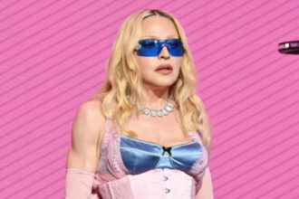 Hunterfly ddddf Madonna during a public appearance as reports emerge about her decision not to attend London Pride due to security concerns.