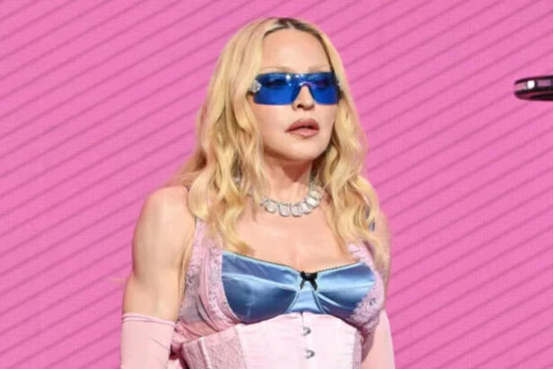 Hunterfly ddddf Madonna during a public appearance as reports emerge about her decision not to attend London Pride due to security concerns.