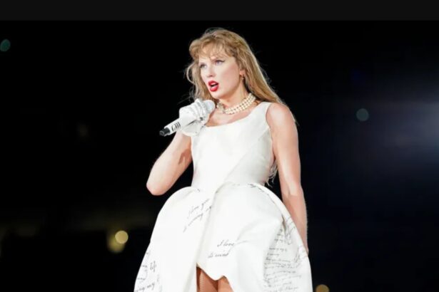 Taylor Swift attending a public event wearing a Dior-inspired fashion look