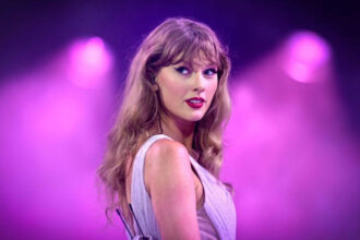 Taylor Swift attending a public event as fans discuss celebrity relationships and media attention.