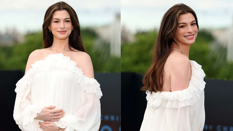 Hunterfly gfdsfds4fd Anne Hathaway wearing a ruffled maternity couture look during The Odyssey London promotional tour