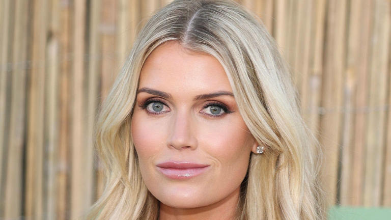 Lady Kitty Spencer's daughter Athena wearing shell clips in her hair during a seaside holiday