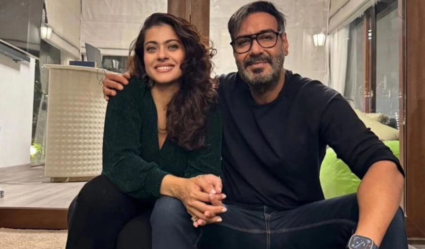 Hunterfly 026 08 05 175009 Ajay Devgn and Kajol sharing a happy moment together.