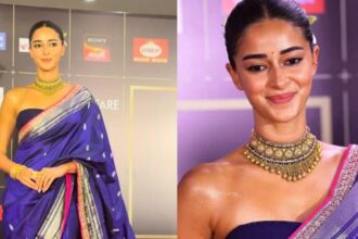 Ananya Panday wearing a royal blue Banarasi saree with a modern strapless blouse at an awards event.