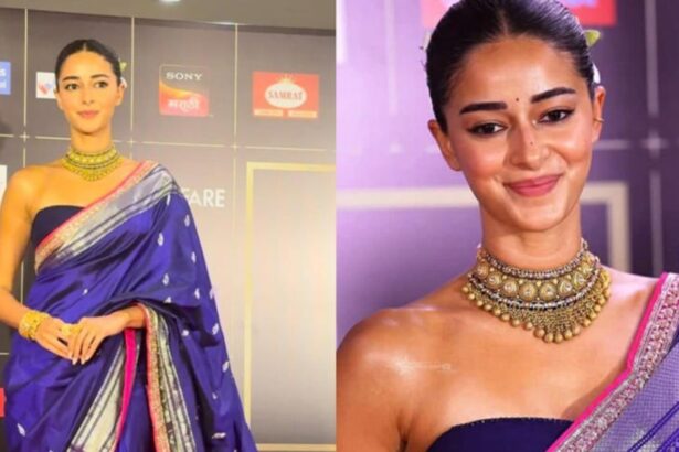 Ananya Panday wearing a royal blue Banarasi saree with a modern strapless blouse at an awards event.