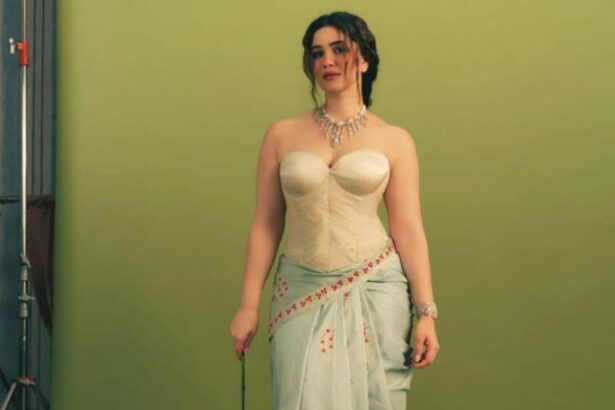 Sara Tendulkar wearing an ivory corset with a pastel green Banarasi saree for her Vogue cover shoot