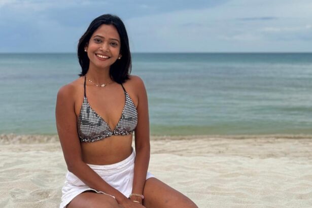Woman with a sun-kissed tan outdoors under bright sunlight