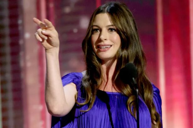 Pregnant Anne Hathaway wearing a purple gown at the 2026 Disney Legends Awards