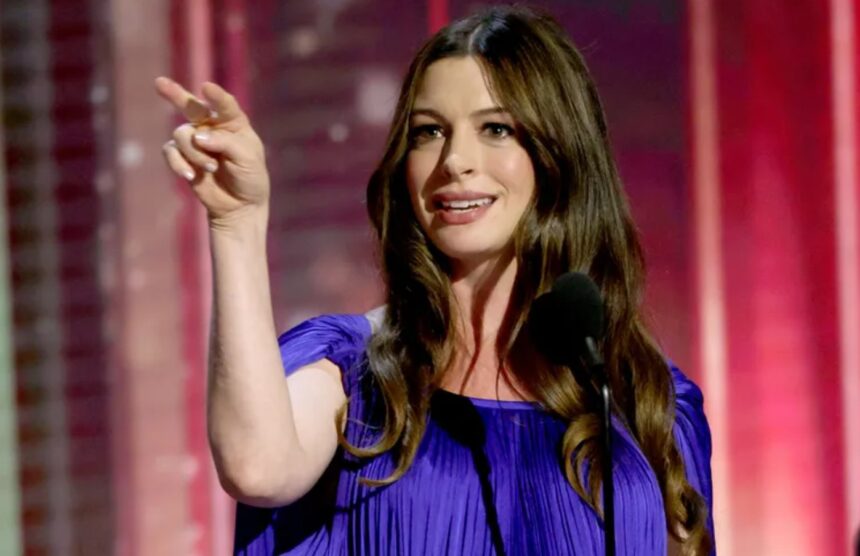 Hunterfly 026 08 22 125644 Pregnant Anne Hathaway wearing a purple gown at the 2026 Disney Legends Awards