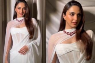Hunterfly 026 08 28 143452 Kiara Advani wearing a white chiffon saree by Manish Malhotra with a 78-carat ruby and diamond necklace.