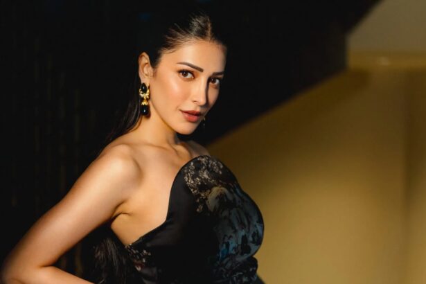 Hunterfly 026 08 31 111755 Shruti Haasan wearing a dark satin printed dress with statement earrings