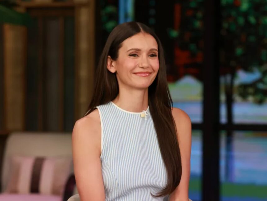 Hunterfly 026 08 31 195237 Nina Dobrev wearing a sky blue halter dress at Finneas and Claudia Sulewski’s wedding