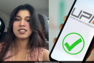 Woman paying with cash instead of UPI while shopping
