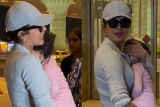 Priyanka Chopra carrying daughter Malti at the airport while interacting with fans.
