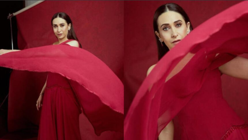 Karisma Kapoor wearing a crimson Ridhi Mehra saree-gown with a dramatic drape