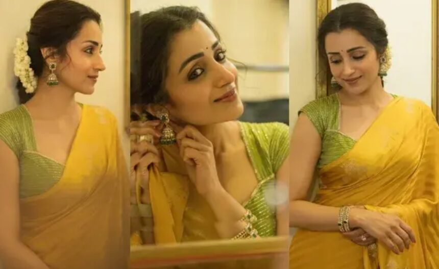 Hunterfly 2026 08 17 150537 Trisha Krishnan in a yellow saree and green blouse with jasmine flowers