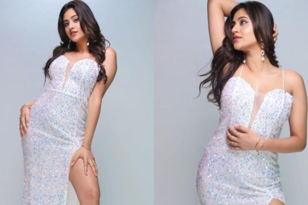 Hunterfly 2026 08 21 210754 Anjali Arora poses in a glamorous white gown during a photoshoot