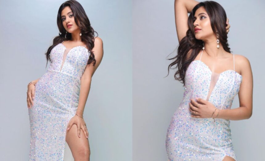 Hunterfly 2026 08 21 210754 Anjali Arora poses in a glamorous white gown during a photoshoot