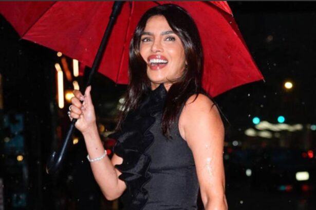 Priyanka Chopra wearing a ruched black maxi dress at The Cycle of Love premiere in New York
