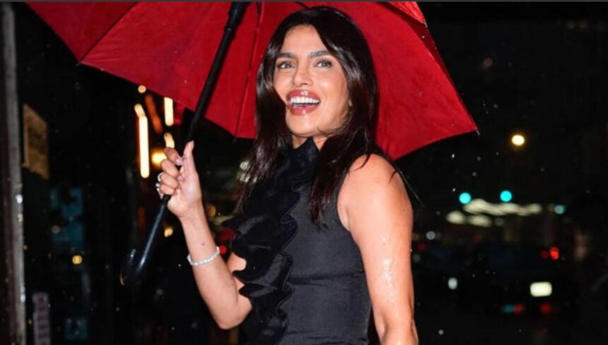 Hunterfly 2026 08 23 173522 Priyanka Chopra wearing a ruched black maxi dress at The Cycle of Love premiere in New York