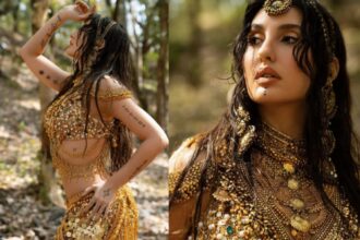 Hunterfly 26 08 01 144239 Model wearing layered golden tribal jewellery with bohemian-inspired accessories and traditional craftsmanship
