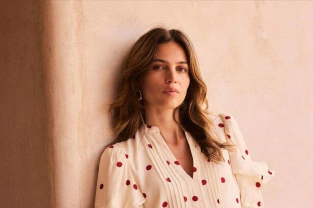 Classic black and white polka dot midi dress styled for summer 2026 fashion trends