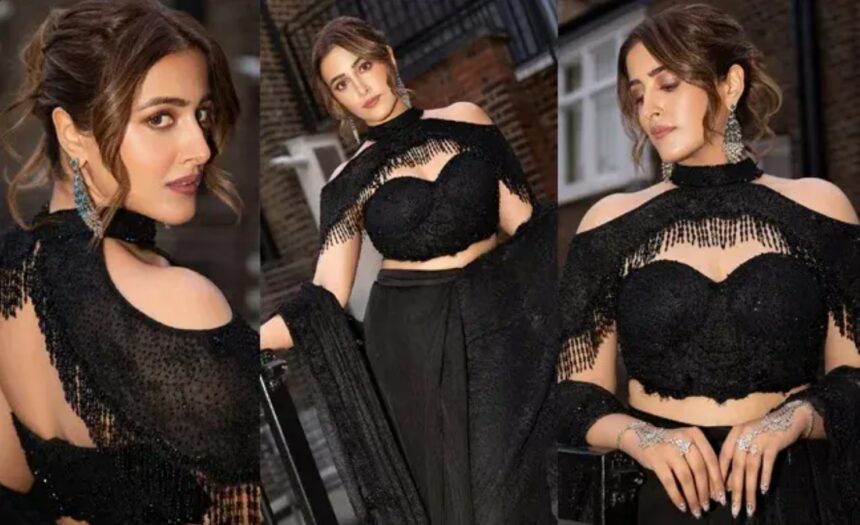 Hunterfly 26 08 05 122742 Nupur Sanon posing in an elegant black dress during her latest fashion photoshoot.