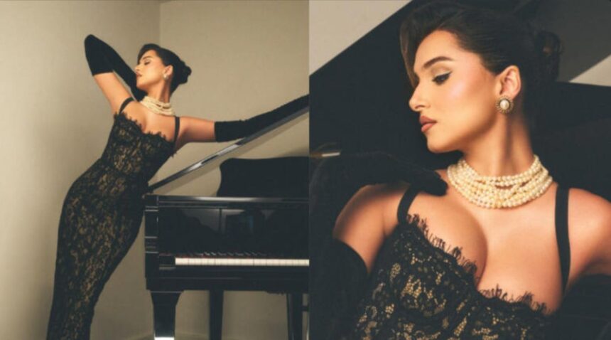 Tara Sutaria wearing a black lace gown with opera gloves and pearl jewellery