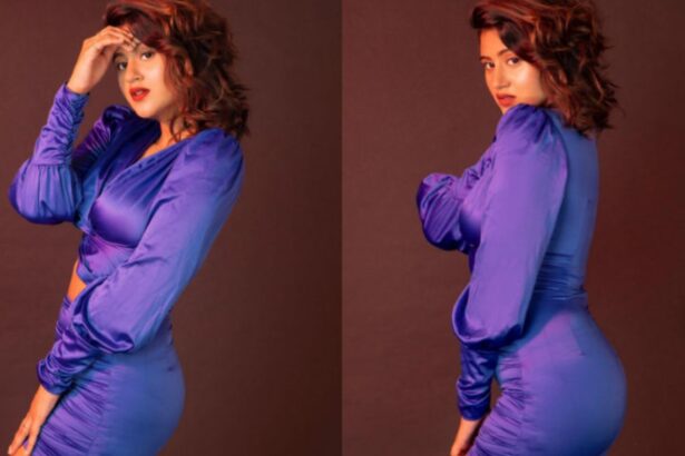 Hunterfly 26 08 21 211418 Anjali Arora poses in a blue dress during a glamorous photoshoot