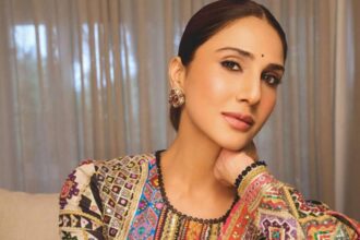Vaani Kapoor posing in a blue bikini in her birthday Instagram photos