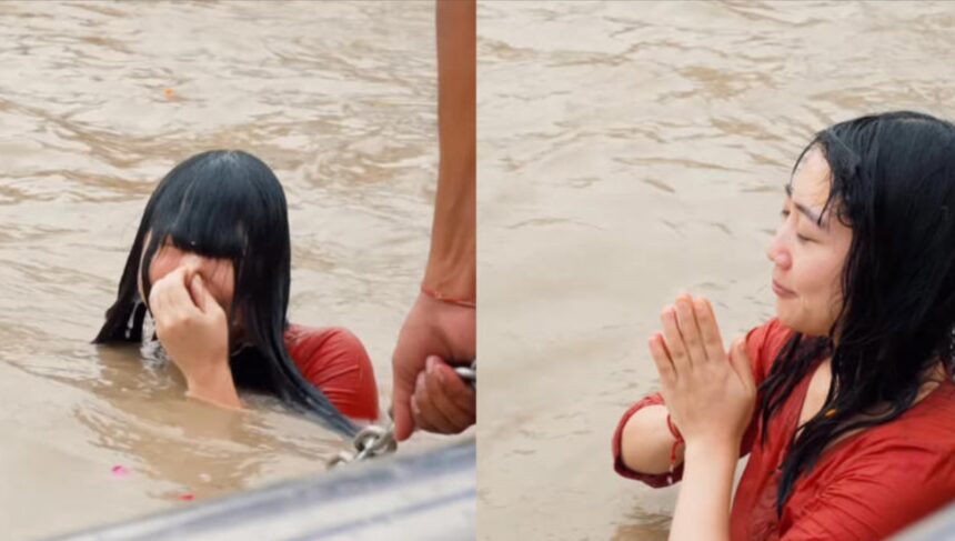 Japanese creator Mayo Japan takes her first holy dip in the Ganga at Haridwar.
