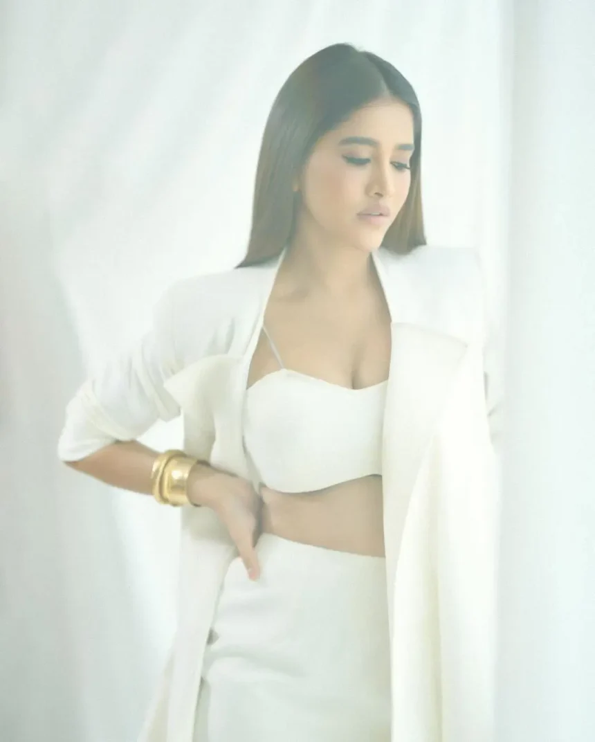 Nabha Natesh poses in an elegant all-white outfit during her latest photoshoot