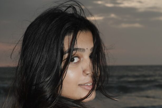 Hunterfly fhsjkdfhjks Ananthika Sanilkumar in a black and white checkered dress at the beach during sunset