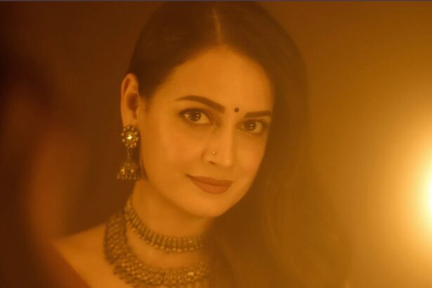 Hunterfly t 2026 08 05 191124 Dia Mirza wearing a handwoven Shruti Sancheti silk satin sari at the Operation Safed Sagar trailer launch
