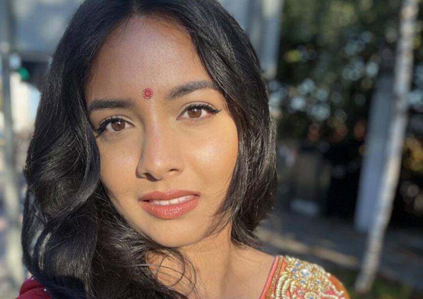 Woman reflecting on her experience of being bullied over her name and identity
