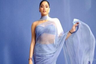 Woman wearing a sheer silk organza outfit while exploring contemporary fashion