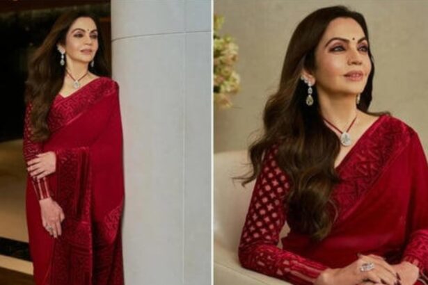 Nita Ambani wearing a crimson red saree at Abu Jani Sandeep Khosla’s 40th anniversary celebration